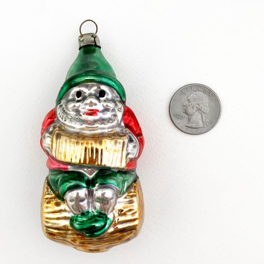 Gnome Playing Accordion on Log Blown Glass Ornament ~ Germany ~ 3-3/4" tall