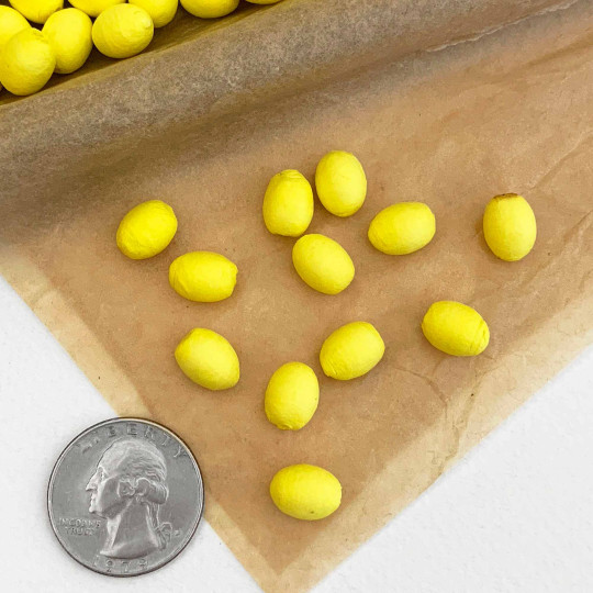 12 Yellow Tiny Spun Cotton Elf Feet, Eggs or Berries ~ 11 x 8mm